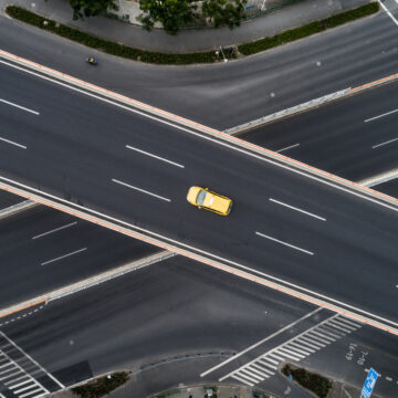 aerial view of one car on highway